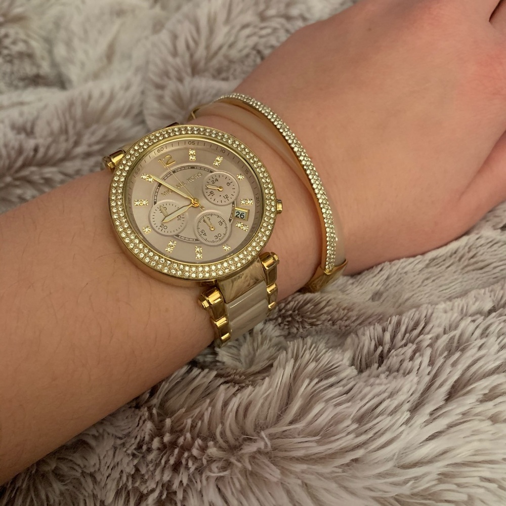 Gold and pink Michael Kors watch and bracelet